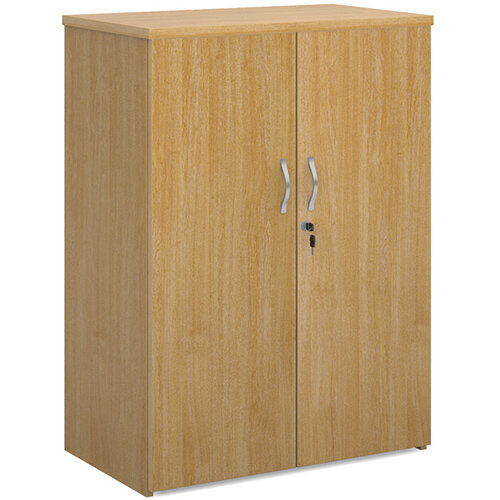 Universal double door cupboard 1090mm high with 2 shelves - oak Universal double door cupboard 1090mm high with 2 shelves - oak
