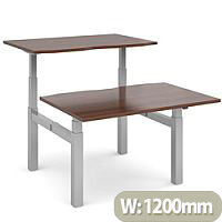 Elev8 Touch Electric Height Adjustable Sit Stand 2 Person Back To Back Bench Desk W1200xD800(x2)xH675-11750mm Walnut Top Silver Frame Elev8 Touch Electric Height Adjustable Sit Stand 2 Person Back To Back Bench Desk W1200xD800(x2)xH675-11750mm Walnut Top Silver Frame