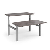 Elev8 Touch Electric Height Adjustable Rectangular Sit Stand 2 Person Back To Back Bench Desk with Scallop Cut Out W1400xD800(x2)xH675-1170mm Grey Oak Top Silver Frame